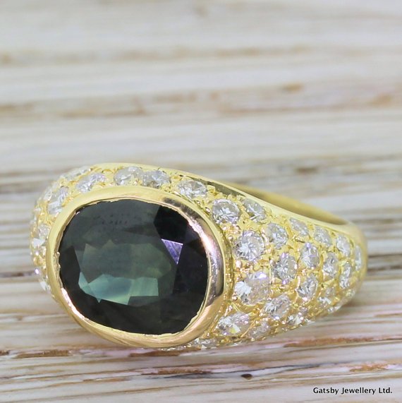 mid century 330 carat green sapphire 038 084 carat diamond ring circa 1960