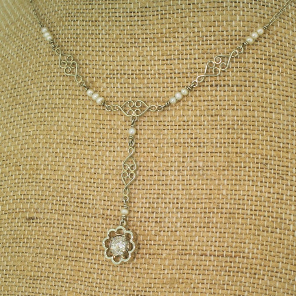 mid century 065 carat old cut diamond 038 seed pearl necklace circa 1950