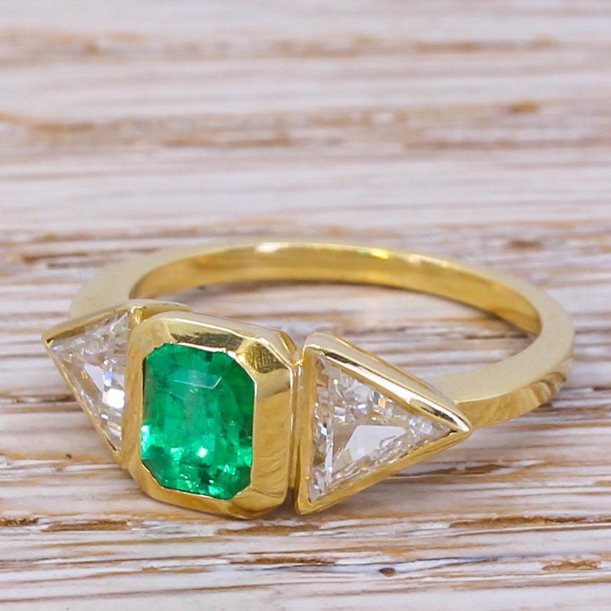 135 carat emerald 038 102 carat trilliant cut diamond trilogy ring 18k gold